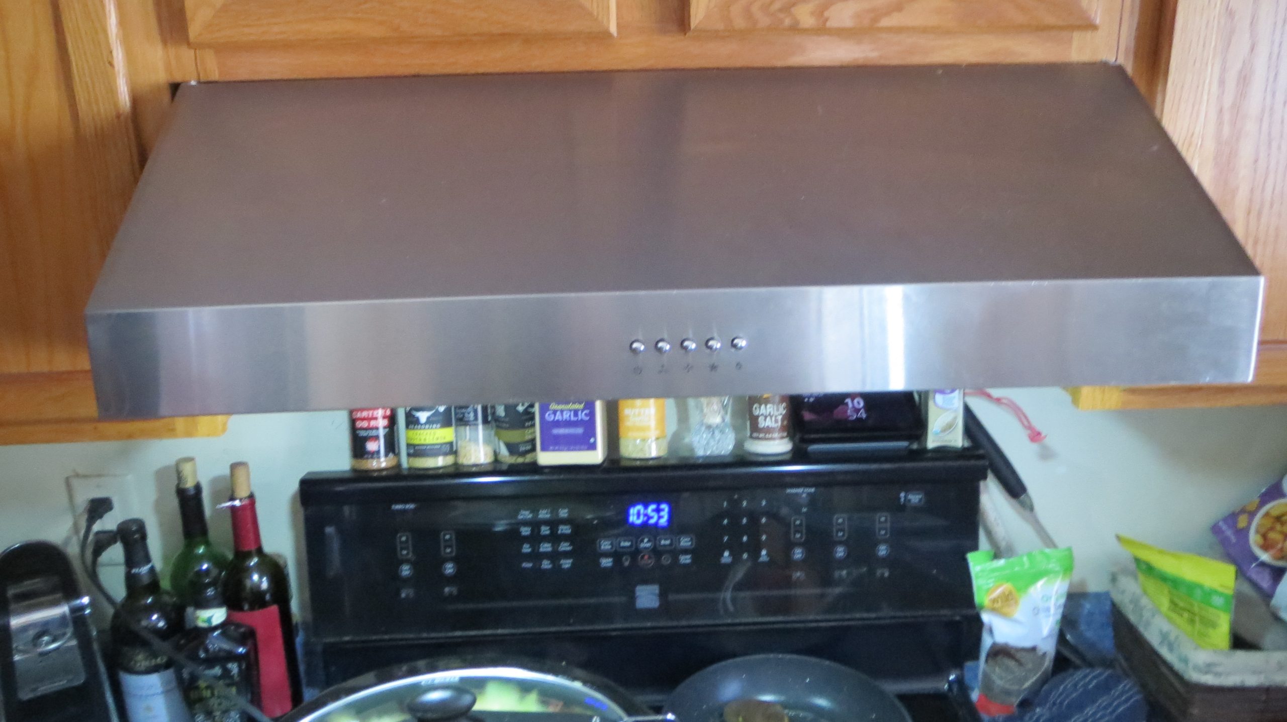 Enhancing Your Kitchen Experience with a Range Hood Featuring Light and Outside Venting